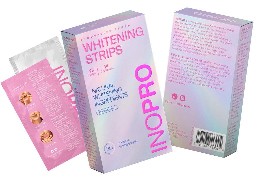 Whitening strips being applied to teeth during treatment