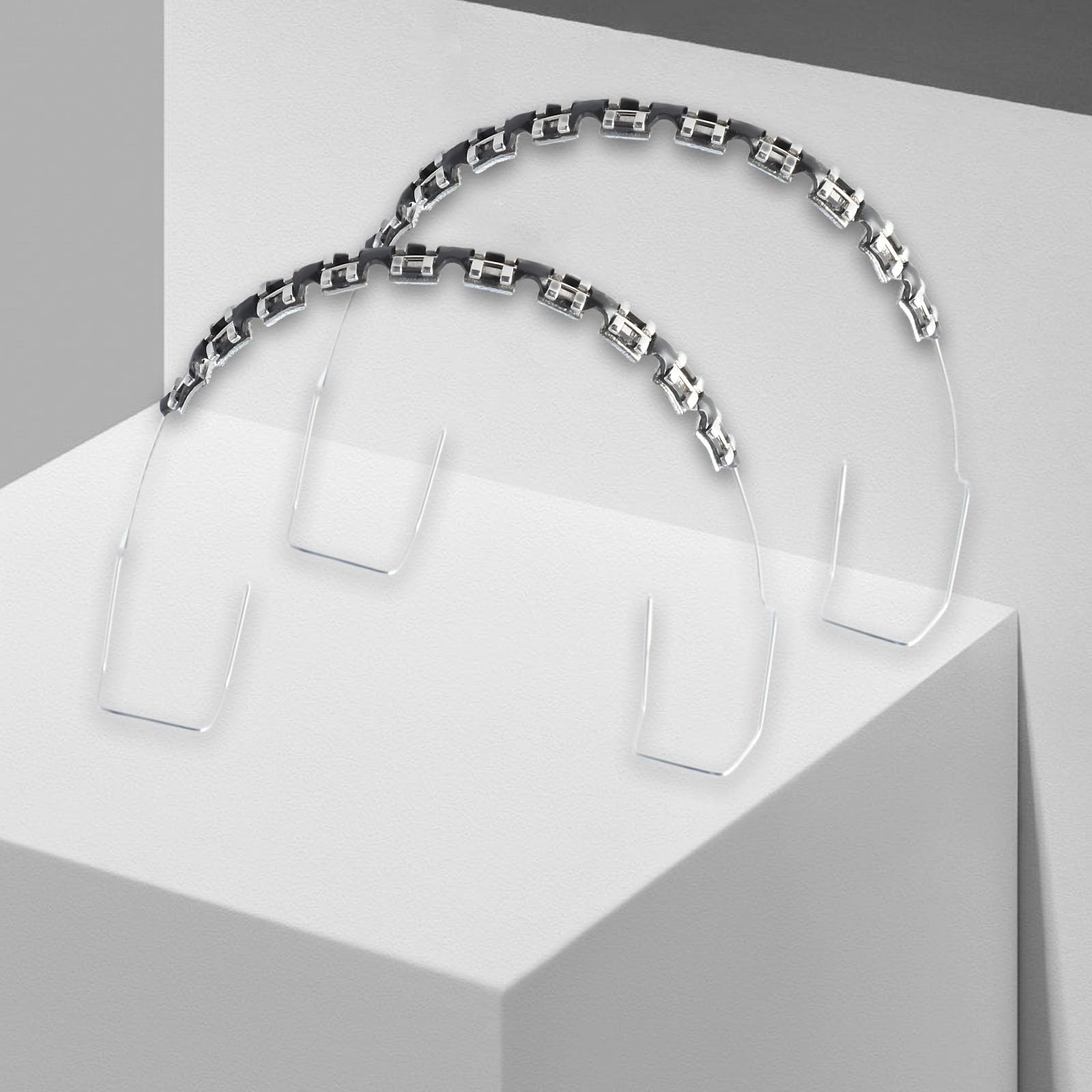 Fake braces installed on a dental mold for display