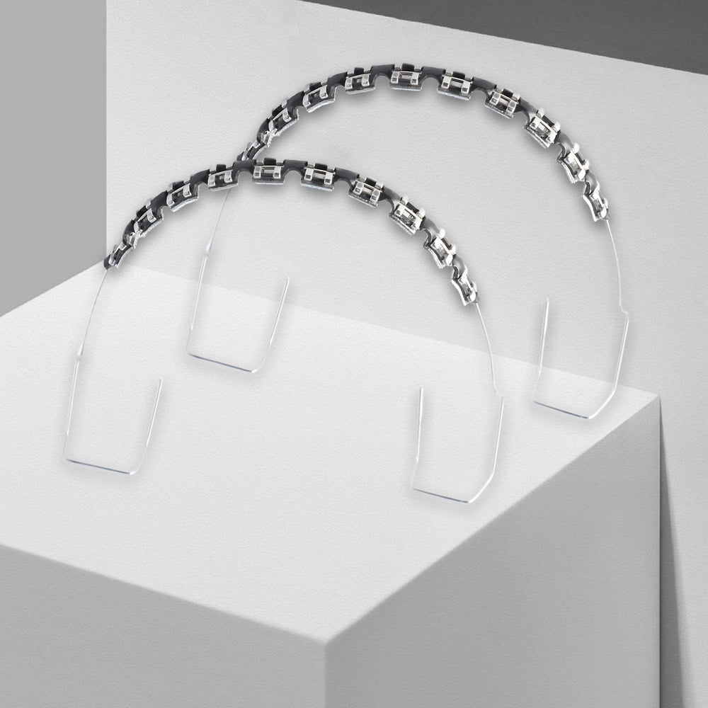 Fake braces installed on a dental mold for display