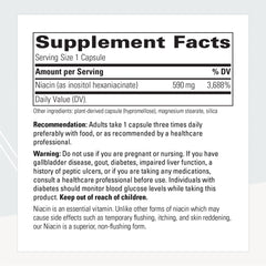 Close-up of niacin inositol hexaniacinate capsules