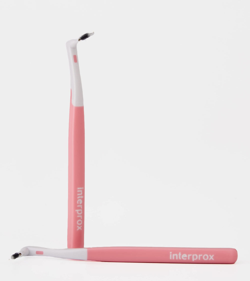 Bi-color bristles indicate plaque and bleeding