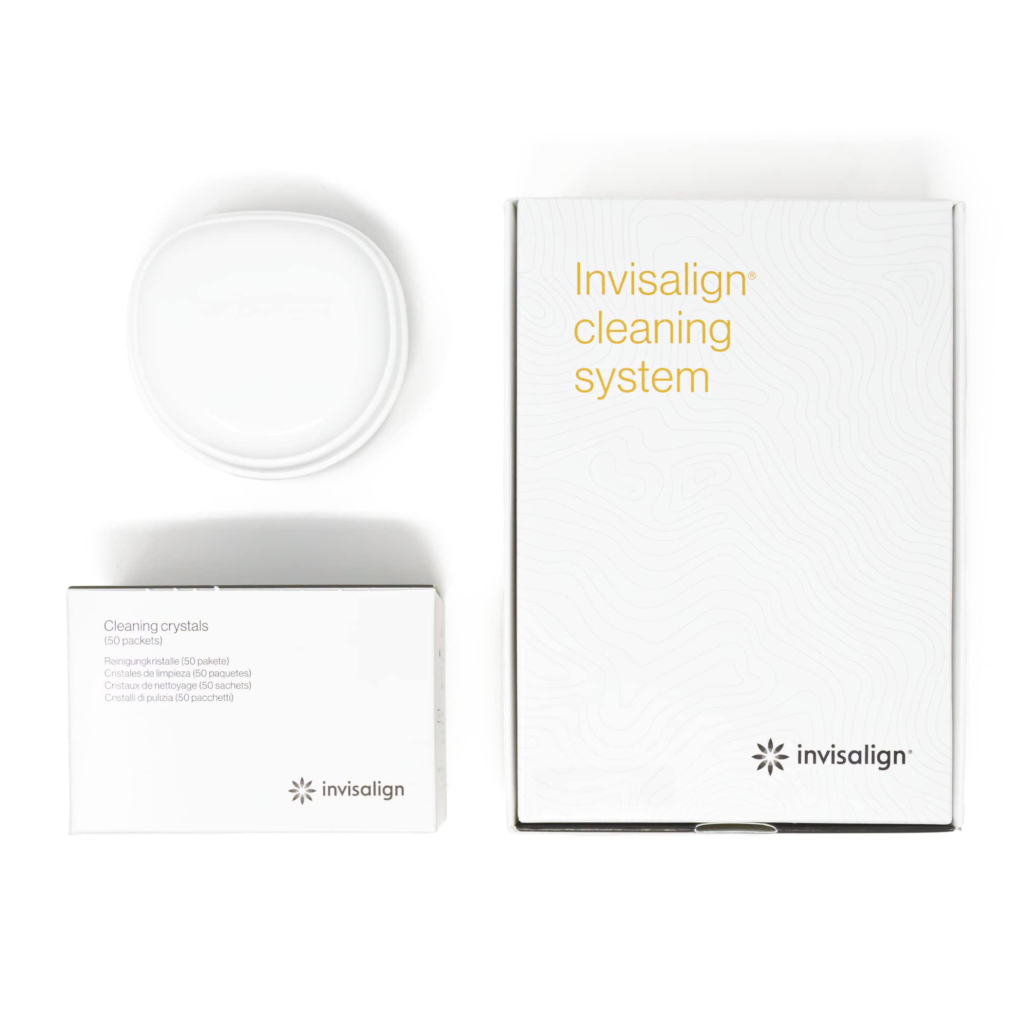 Close-up of the tub, crystals, and 50 packets for cleaning Invisalign aligners