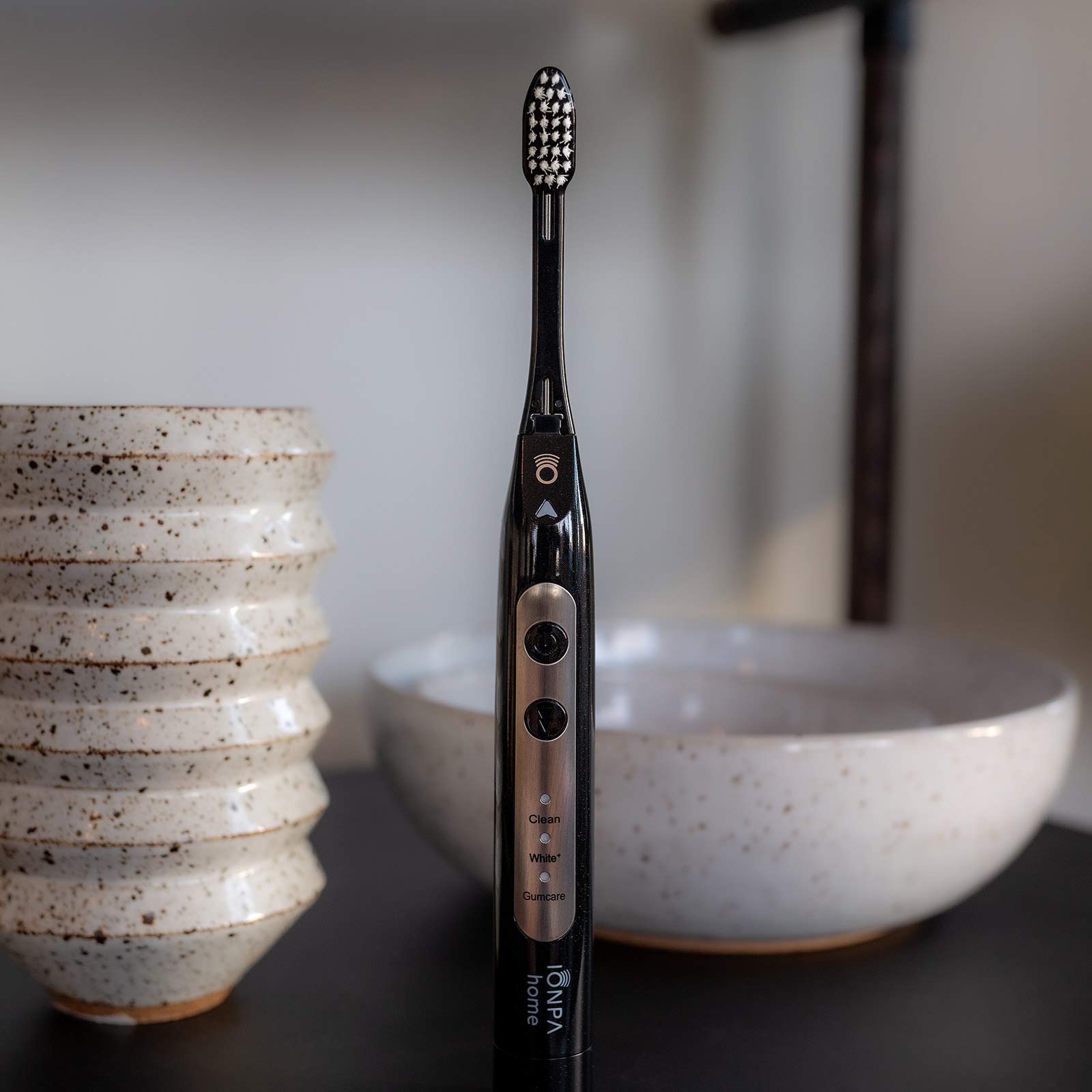Toothbrush in use showing water brushing action