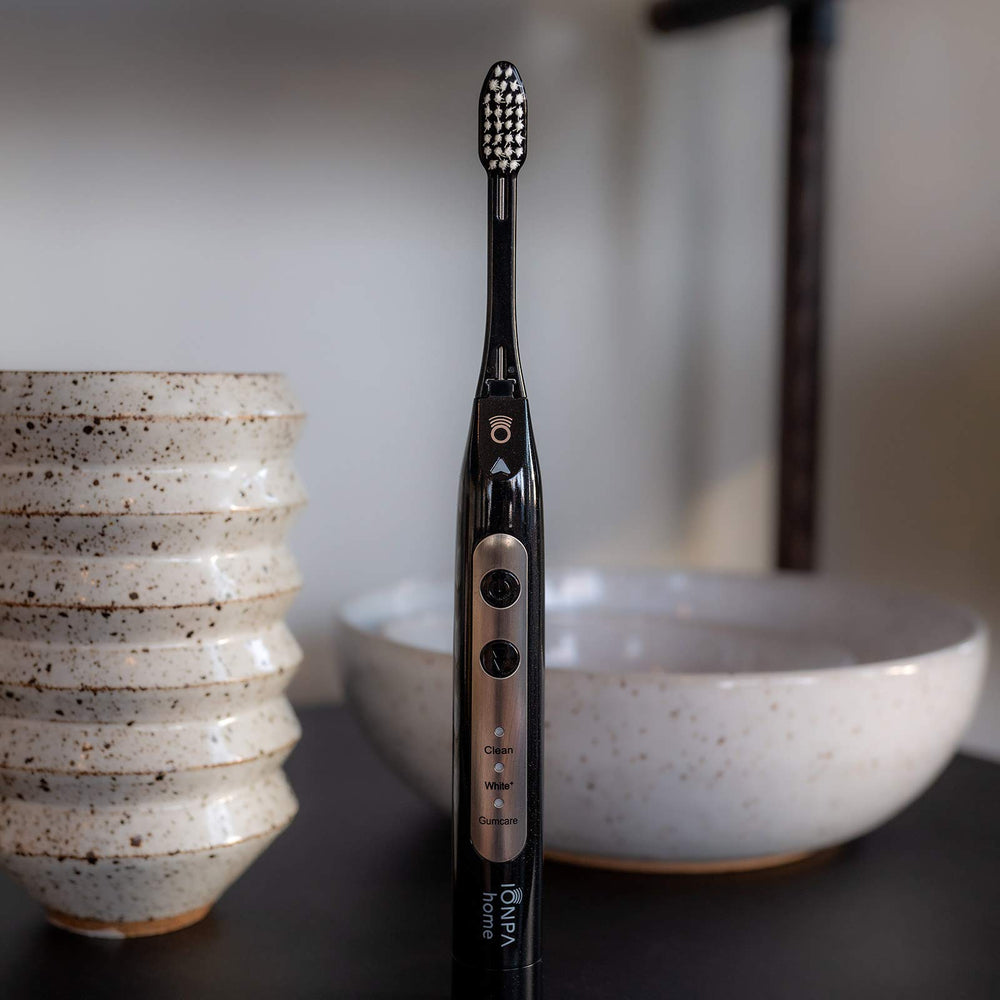 Toothbrush in use showing water brushing action