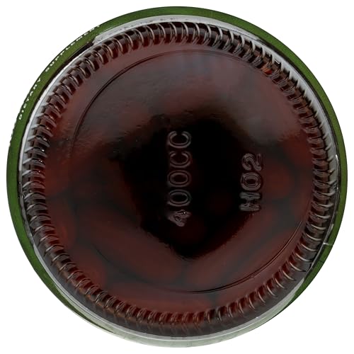 Capsules displayed beside the bottle