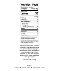 Close-up of Isagenix Moringa Greens scoop pouring powder into a glass