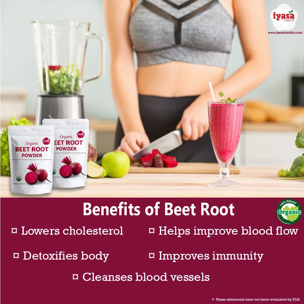Organic beet root powder in a glass with leaves