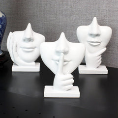 Close-up of sculpted nose eyeglass holder in white
