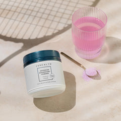 Close-up of powder scoop with Raspberry Lemonade flavor