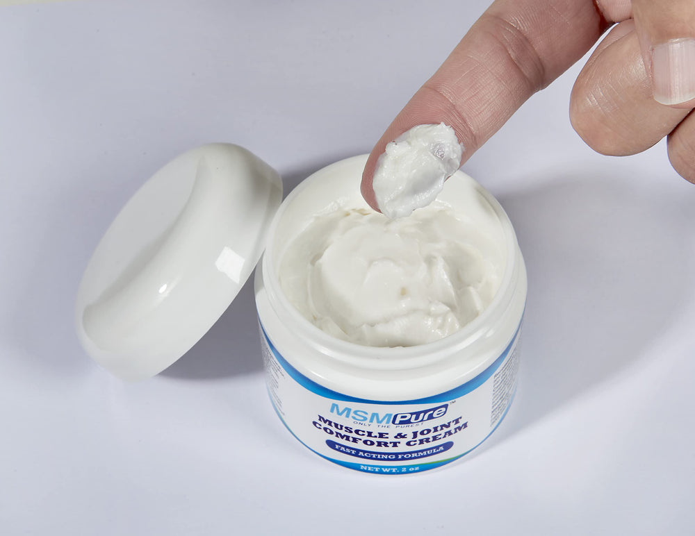 Person applying MSMPure MSM Cream to joint area