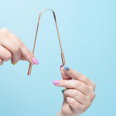 Tongue cleaner with wide scraping edge for efficient cleaning