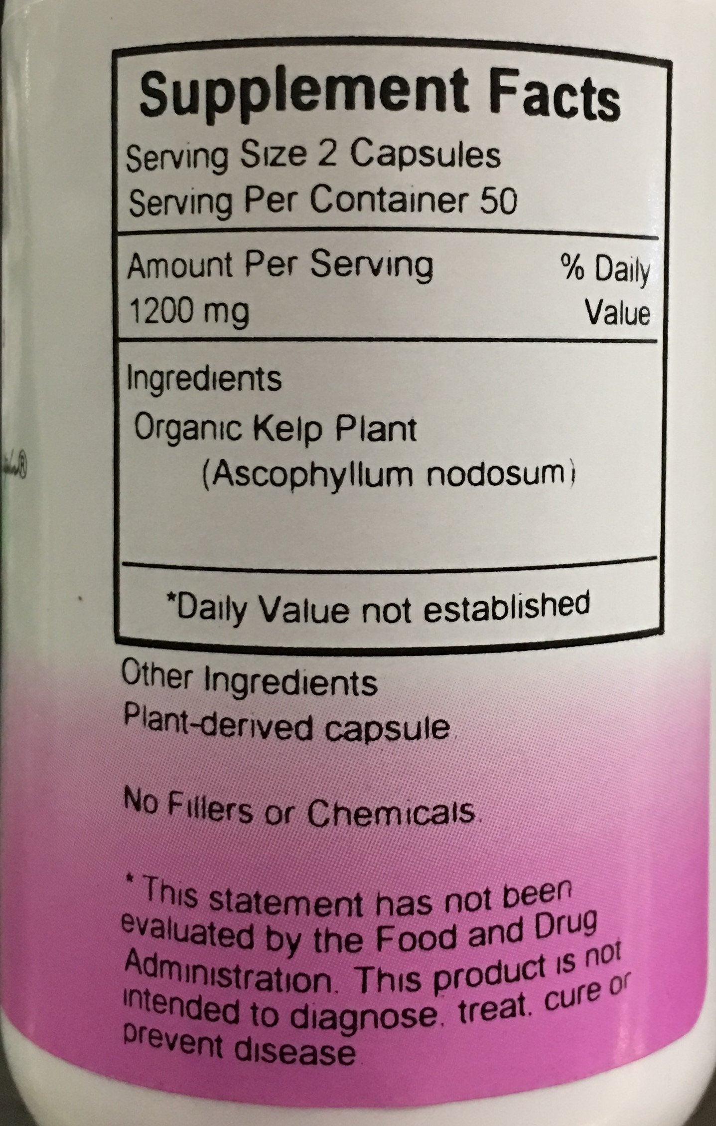 Close-up of kelp capsules in bottle