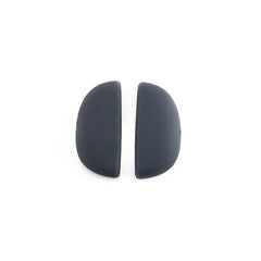 Soft silicone kids eyeglass nose pads in grey, close-up