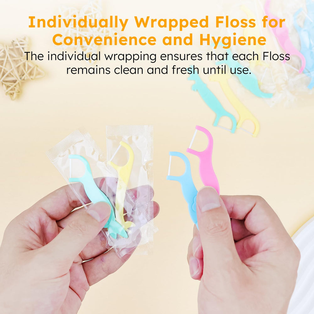 Children's dental floss picks featuring animal shapes