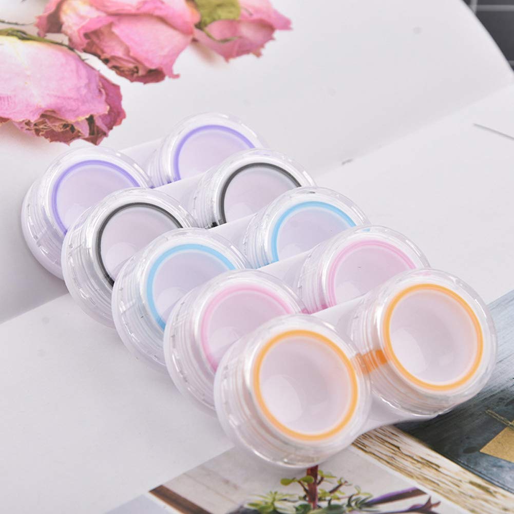 Transparent plastic lens case showing interior compartments