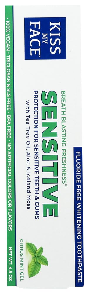 Toothpaste on toothbrush showing whitening formula with Citrus Mint Gel