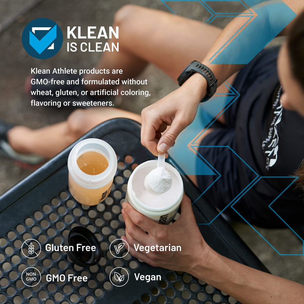 Klean Athlete Klean Hydration glass serving the drink during a workout.