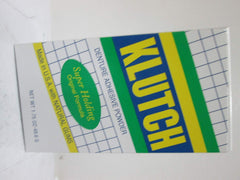 Close-up of Klutch Denture Adhesive Powder texture