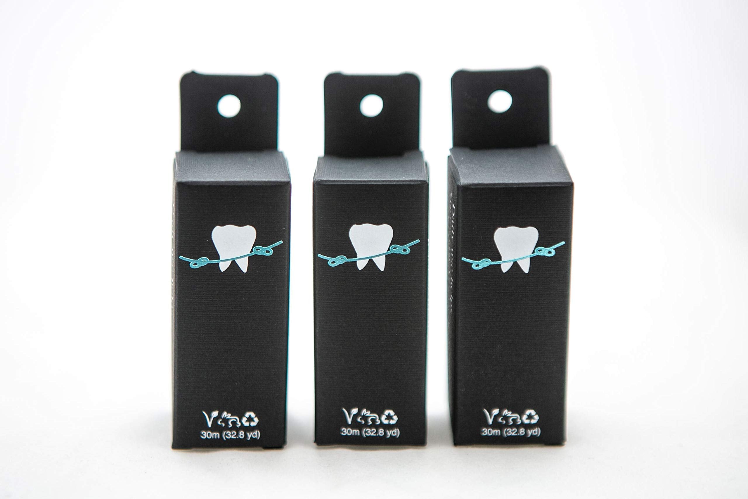 Close-up of bamboo charcoal floss with grapefruit seed extract and mint