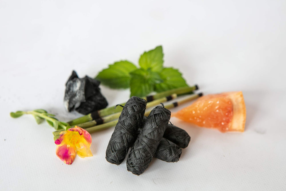 4 pack of Knotty Floss bamboo charcoal floss refills