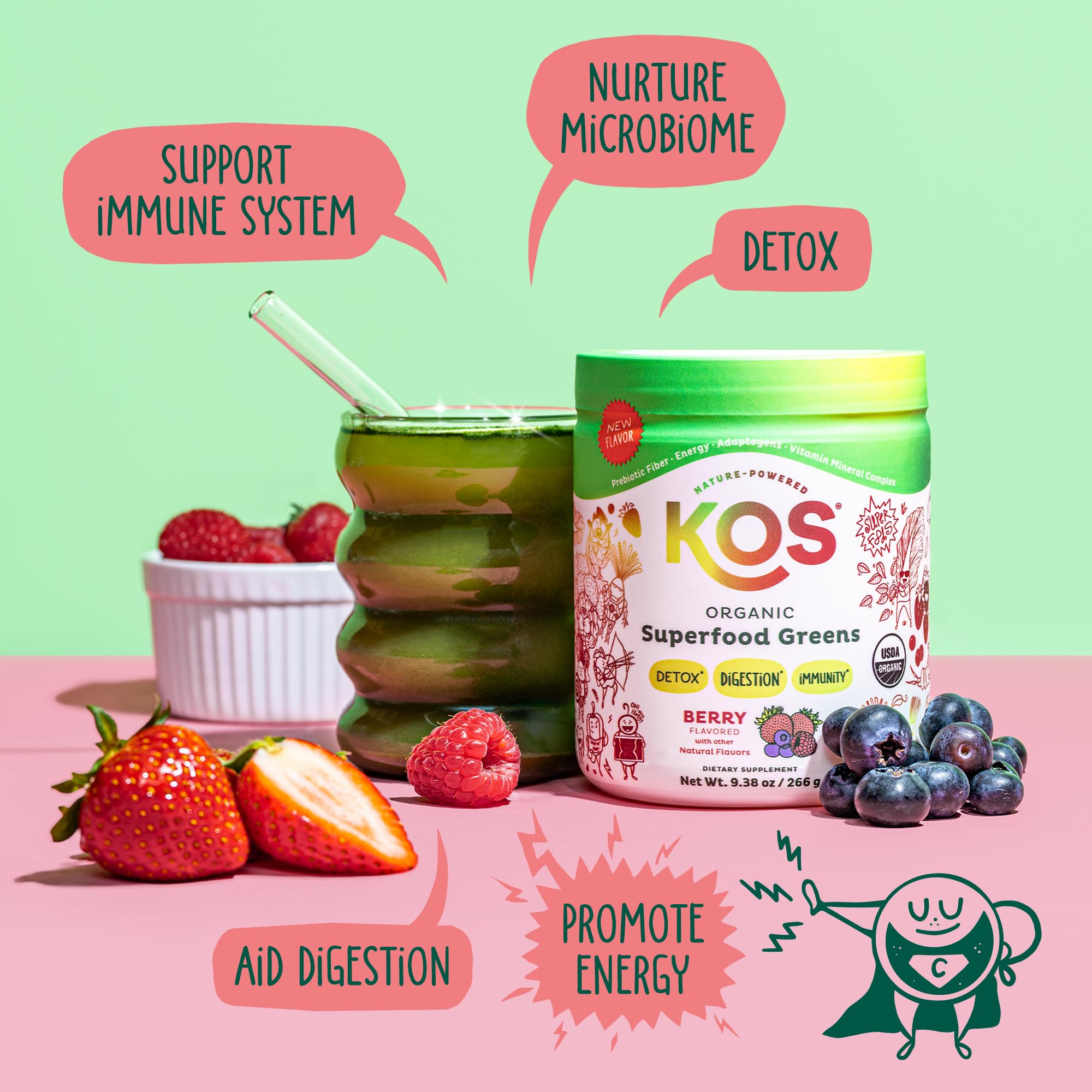 Berry flavored KOS Greens powder scoop with glass of water