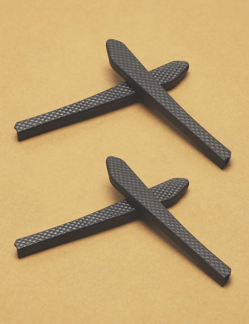 Close-up of black silicone temple sleeve grip