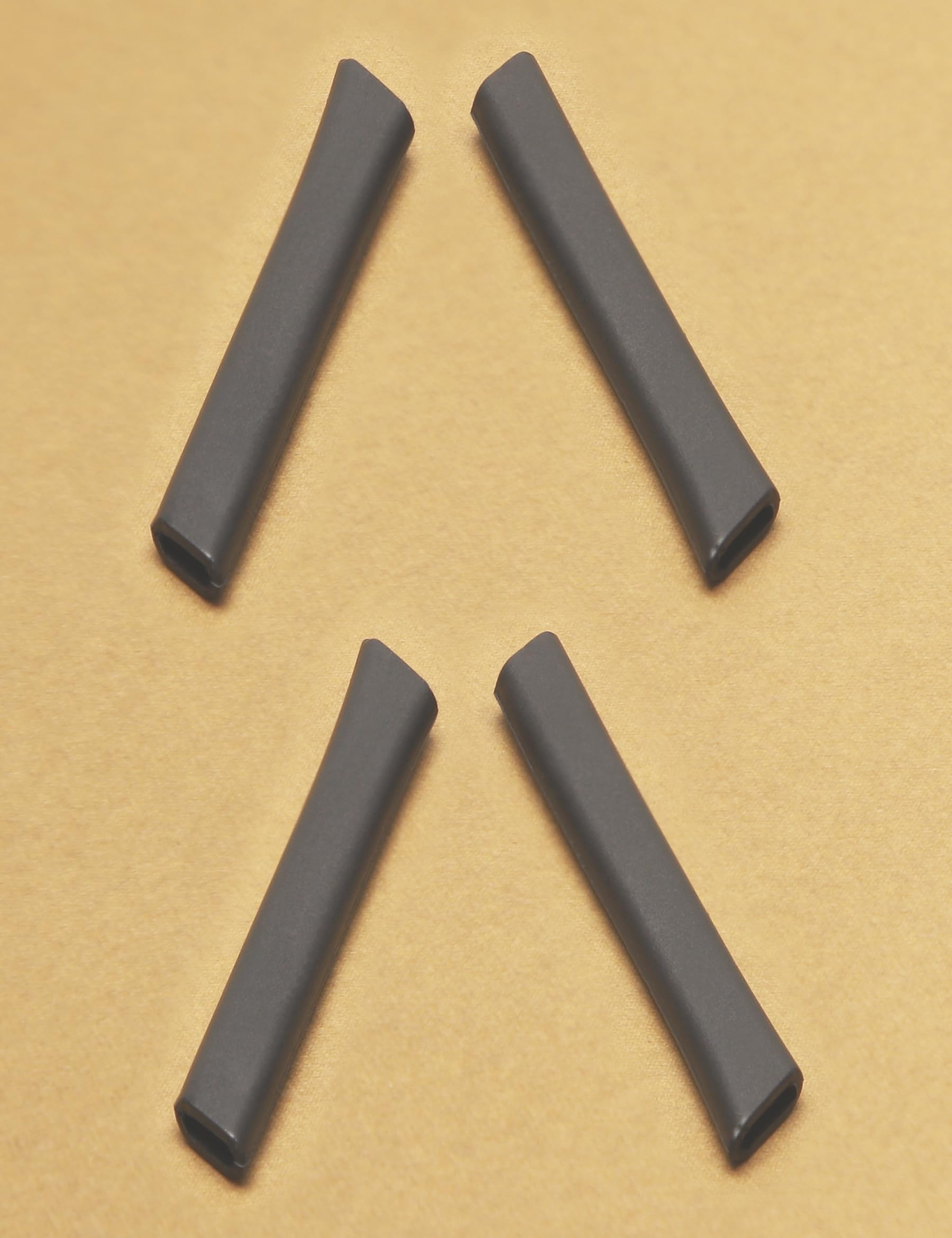 Two Kygear temple sleeves with packaging