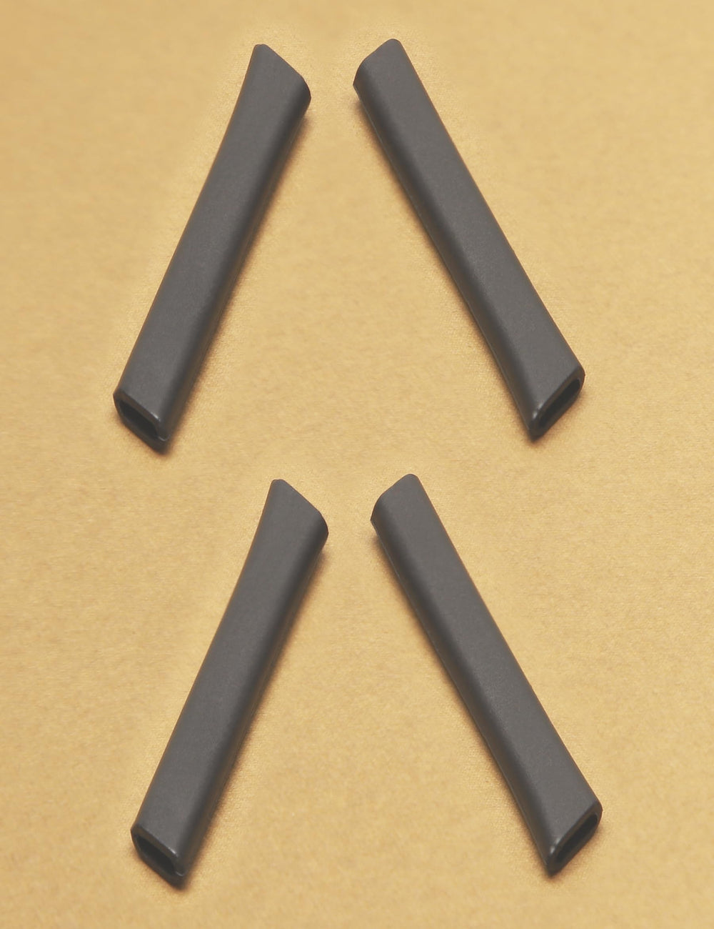 Two Kygear temple sleeves with packaging
