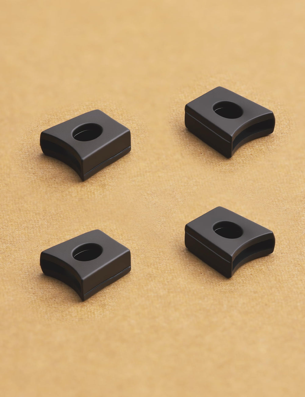 Close-up of black nose bridge flex coupler for Oakley Juliet