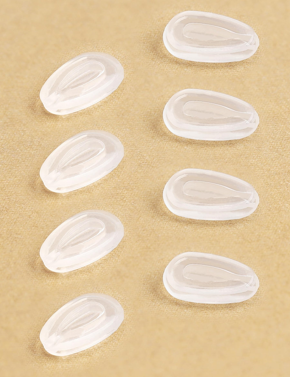 Close-up of Kygear silicone nose pads installation on sunglasses