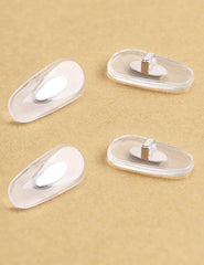 Close-up of transparent silicone replacement nose pad for eyewear