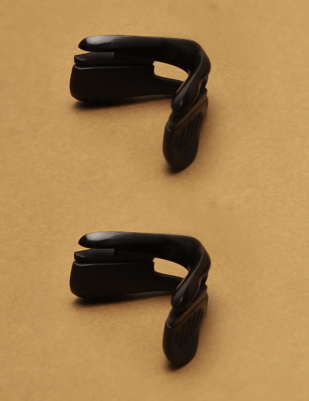 Slip-on installation of Kygear nose pads onto eyewear nose bridge