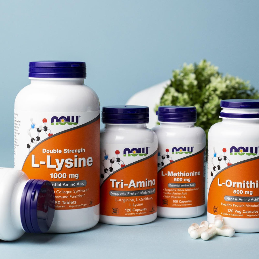 Close-up of L-Arginine, L-Ornithine, L-Lysine text on bottle