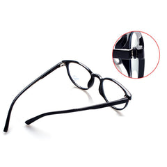 Eyeglass temple tighteners mounted on frame