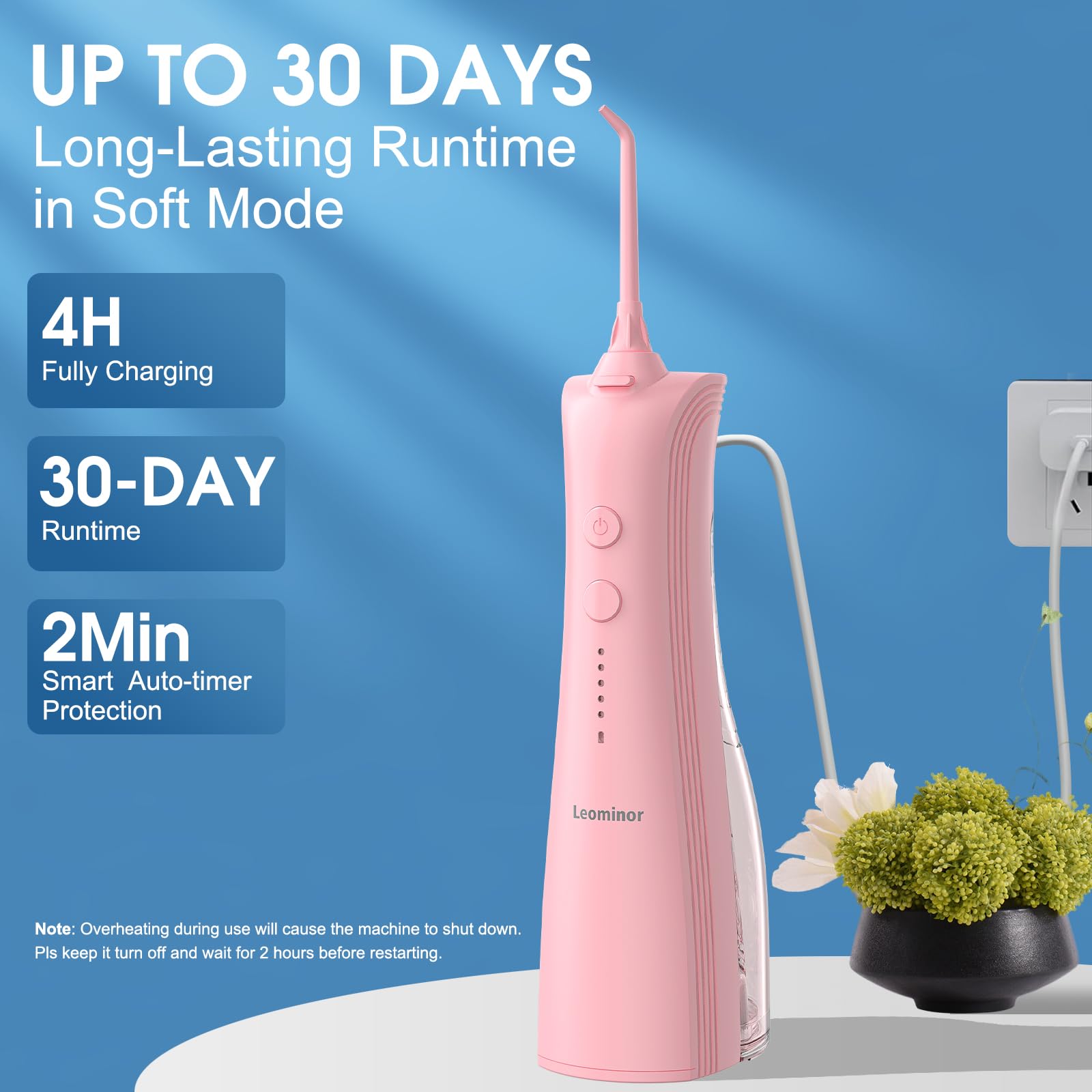 Leominor pink water dental flosser in use