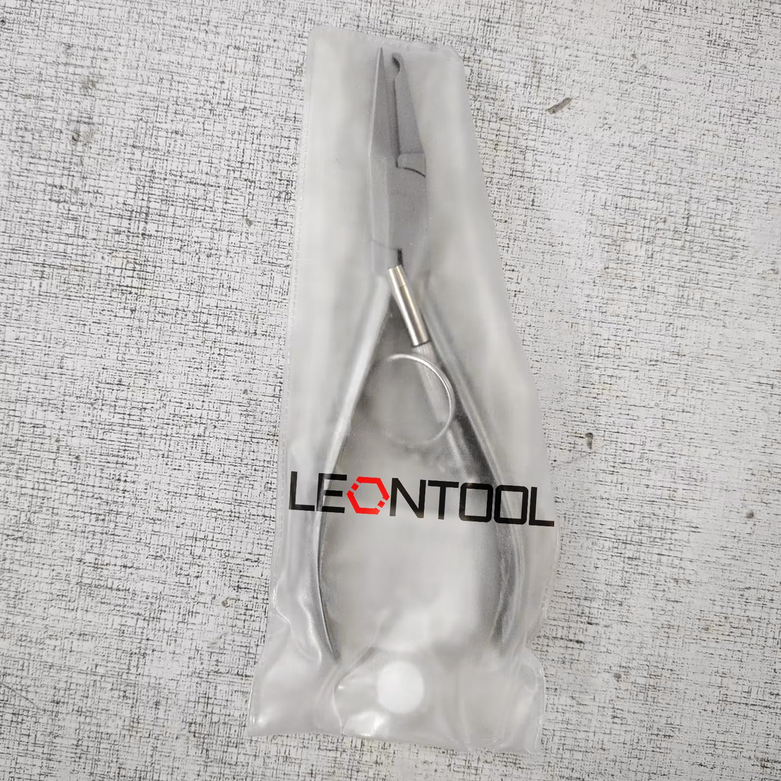 LEONTOOL eyeglasses repair tool in use for nose pad adjustments