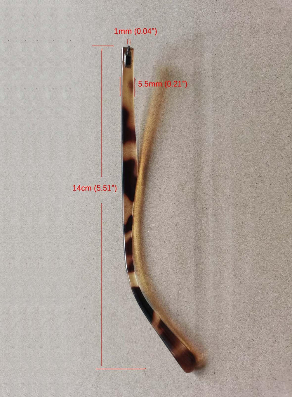 Close-up of leopard print replacement arms for glasses