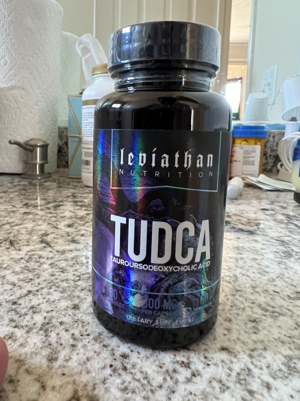 Leviathan Nutrition TUDCA bottle pour suggests simple daily dosing routine.