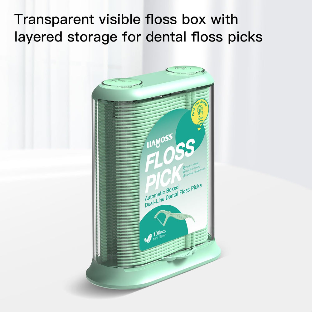 Green LIAMOSS dental floss dispenser on a blue background