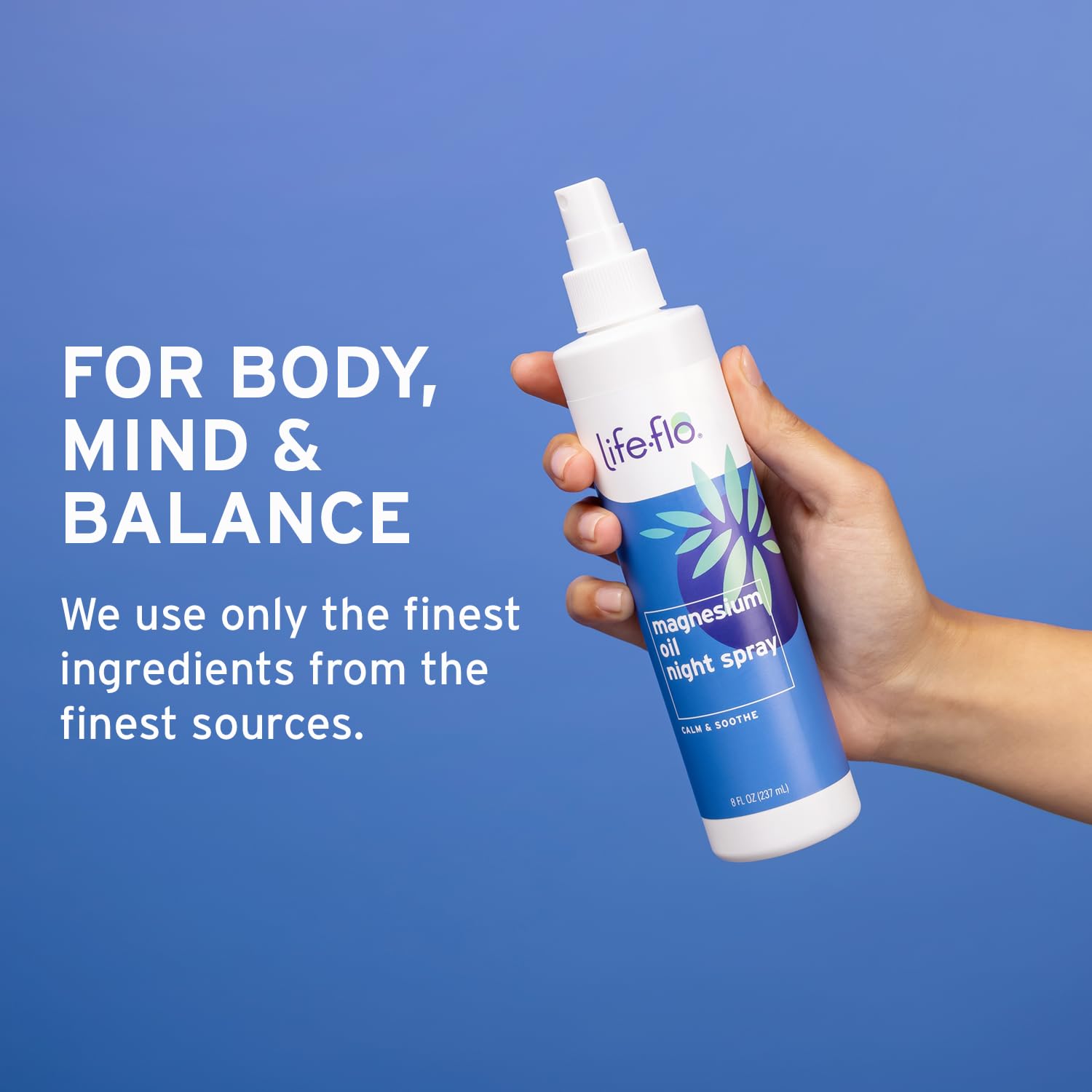 Person applying magnesium oil night spray to skin before bed