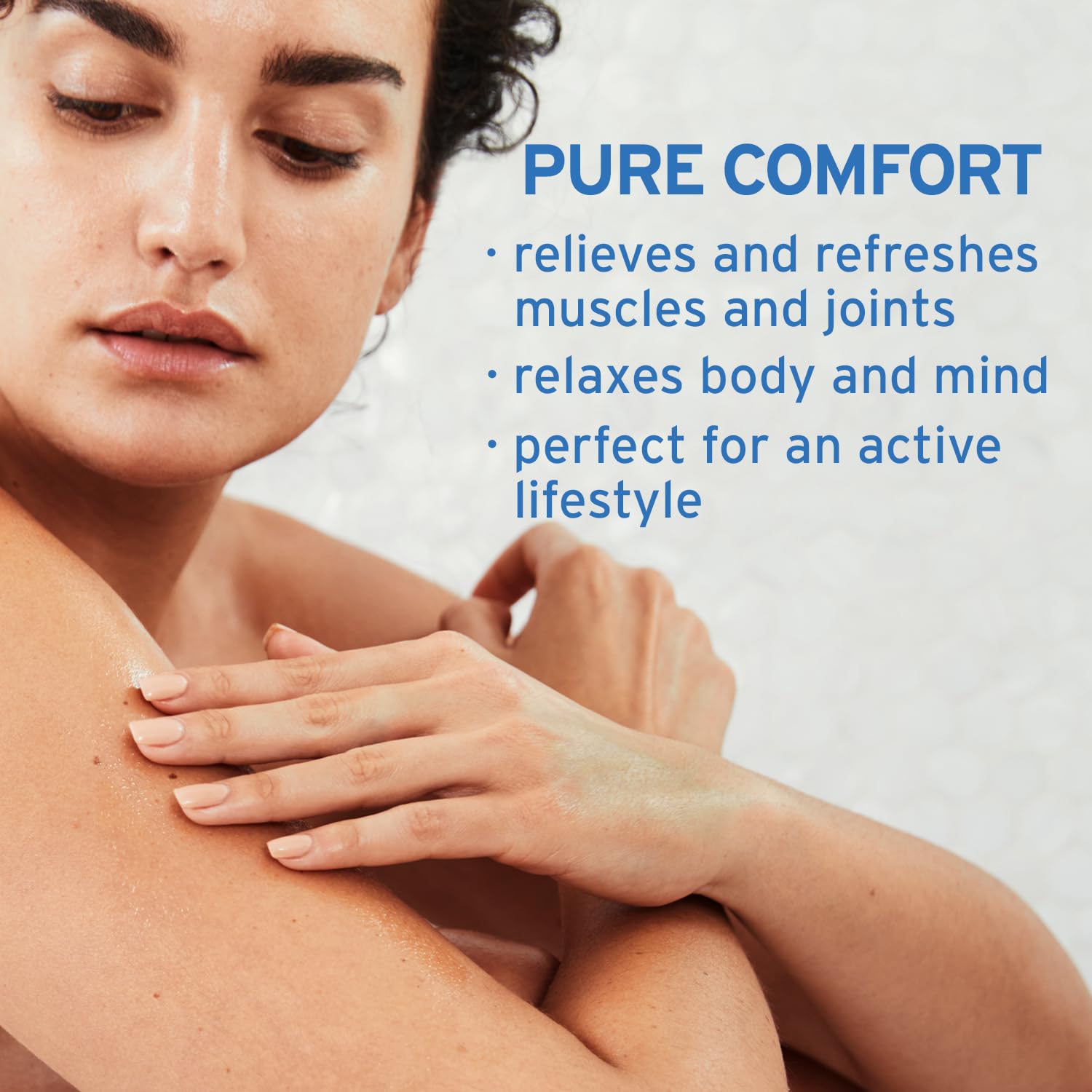 Feet applying Life-Flo Magnesium Oil Sport Roll-On after activity