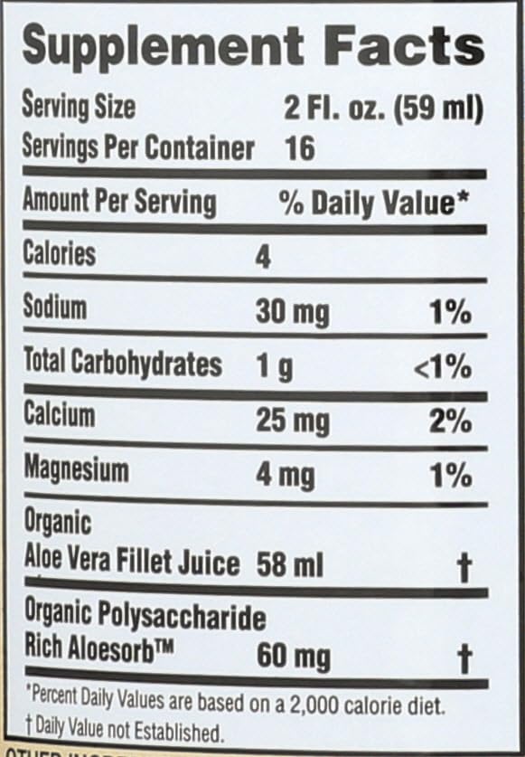 Natural aloe vera gel bottle beside aloe leaves