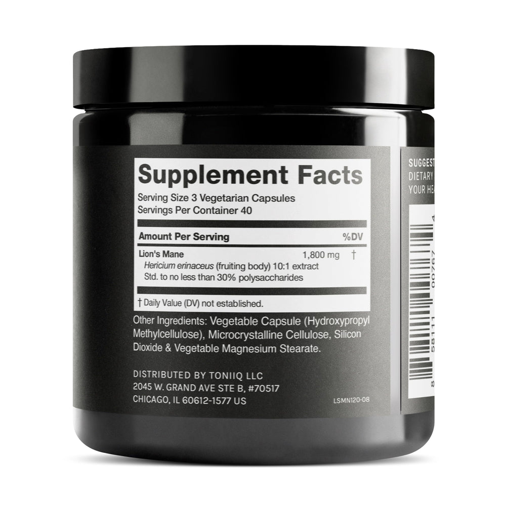 Close-up of Lion's Mane capsules from the bottle