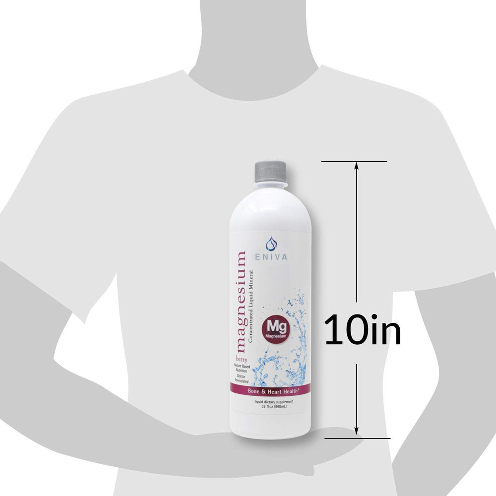 Magnesium supplement being used with a berry-flavored liquid in a glass.