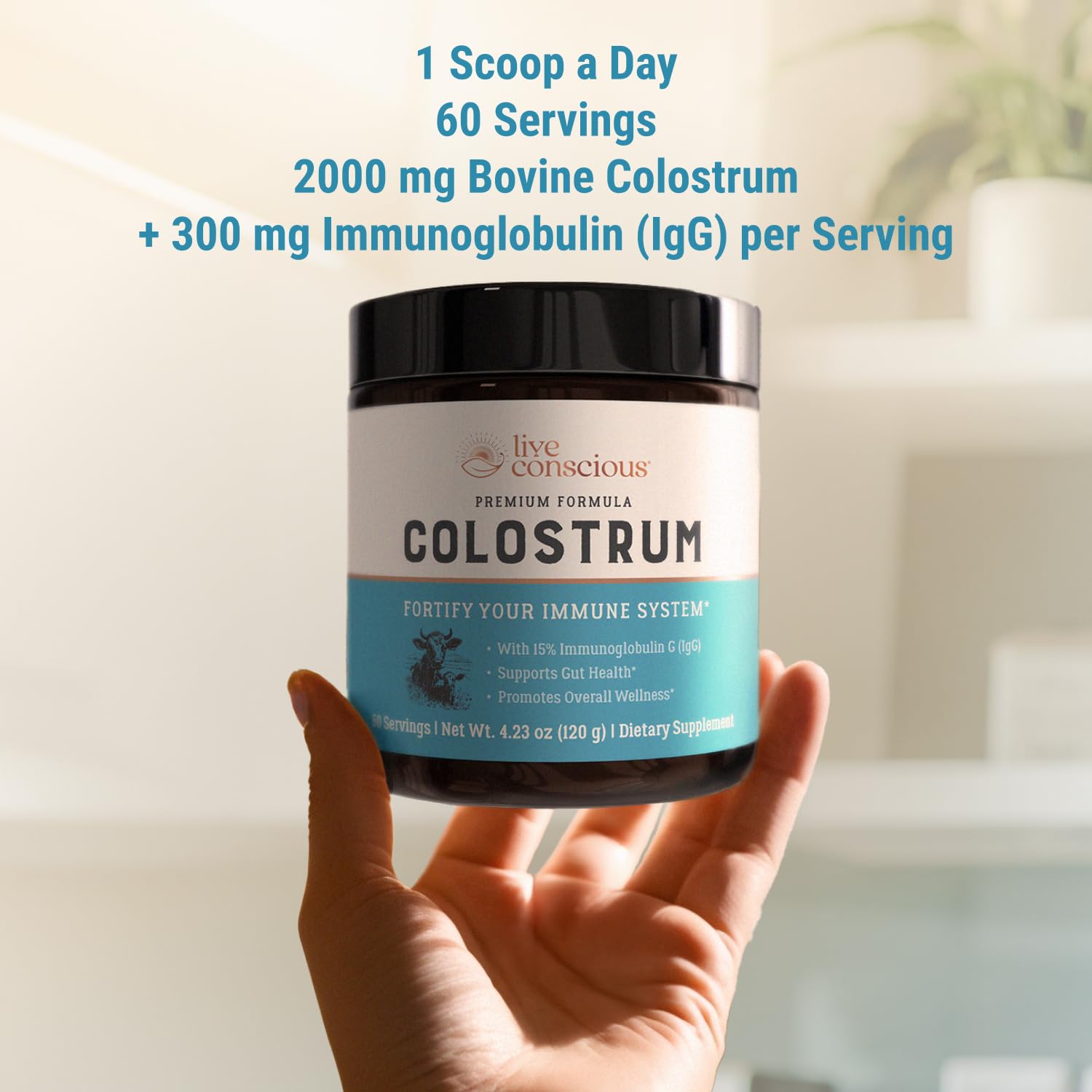 Scoop of colostrum powder on a wooden surface