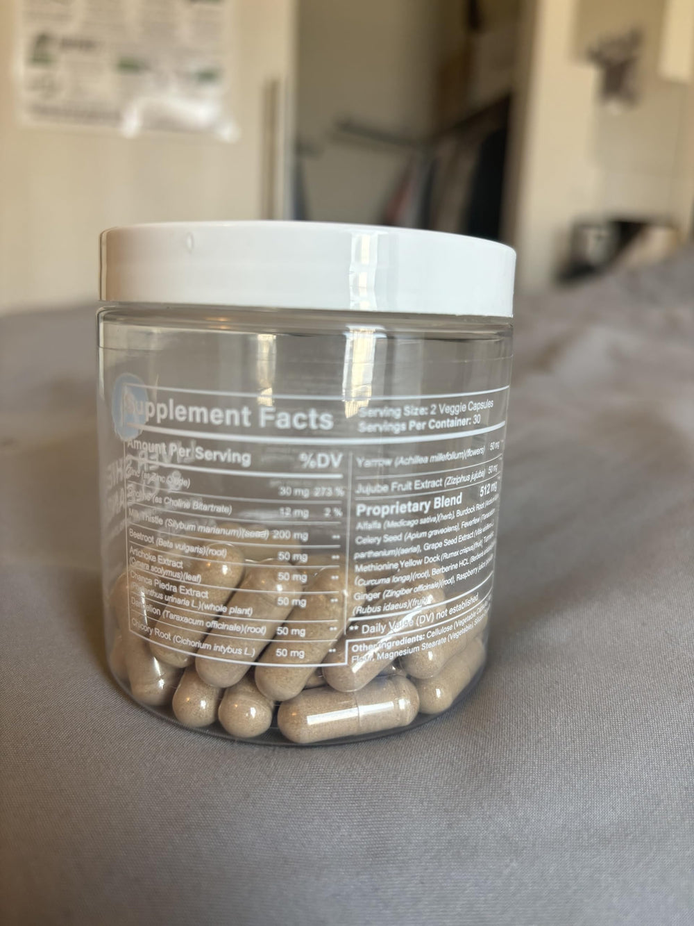 Usage image showing two capsules per day for liver health and digestion
