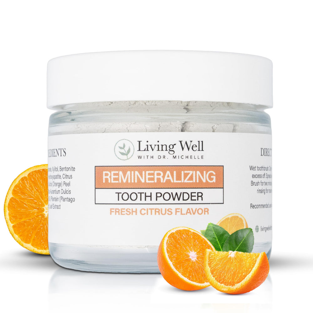 Front view of Living Well Citrus Remineralizing Tooth Powder bottle