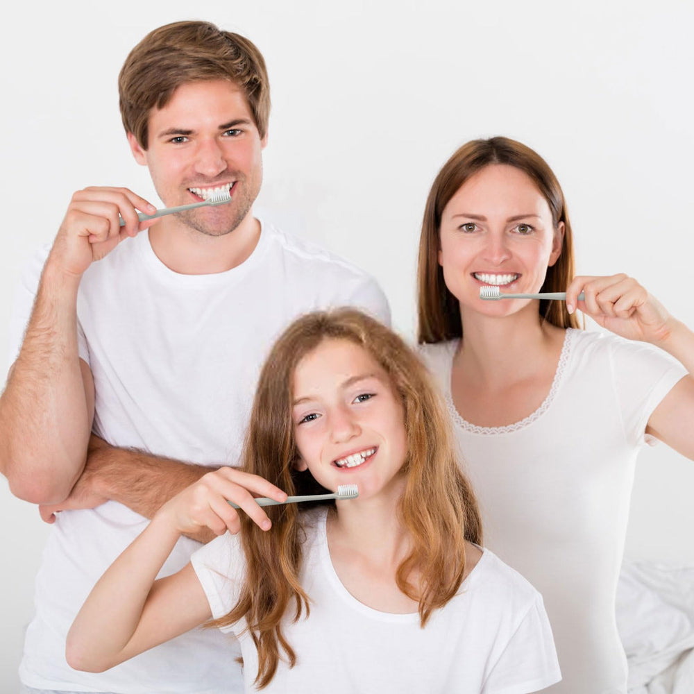 Ergonomic gray handle toothbrush design
