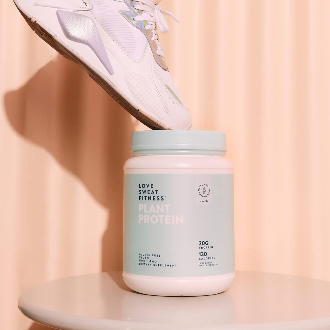 Packaging of Love Sweat Fitness vegan protein powder on kitchen counter