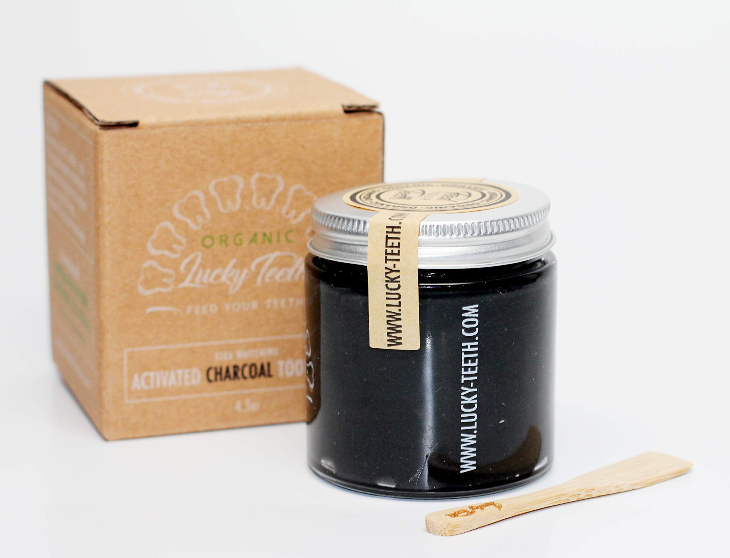 Front view of Lucky Teeth Charcoal Toothpaste Xtra Whitening in a glass bottle